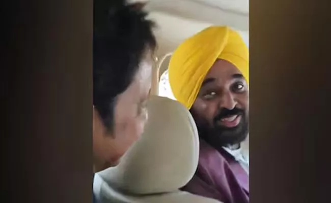 Opposition slams on Bhagwant Mann singing video viral - Sakshi