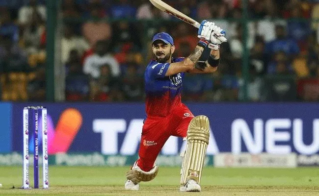 Virat Kohli slams fifty to guide RCB to 182-6 against KKR  - Sakshi