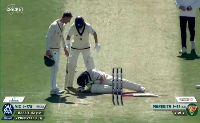 Victorian Batter Will Pucovski Faced A Daunting Blow To His Helmet By A Delivery From Tasmania Riley Meredith - Sakshi