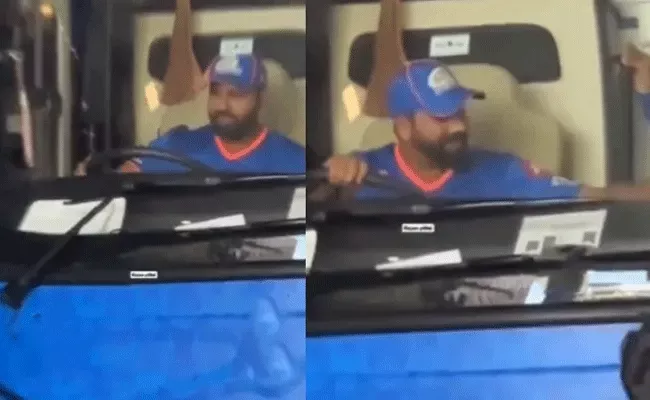 Rohit Sharma hilariously tries to drive Mumbai Indians team bus - Sakshi