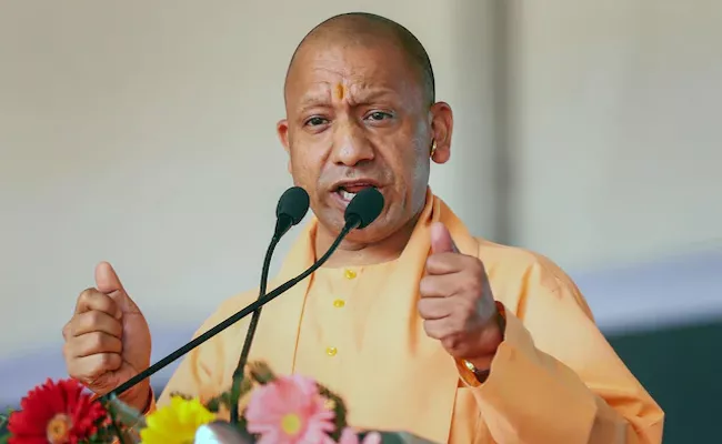 Vote For NDA to Put an End to Dynasty Politics Says Yogi Adityanath - Sakshi