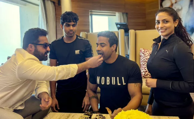 Jr NTR Celebrates His Fitness Trainer Birthday - Sakshi