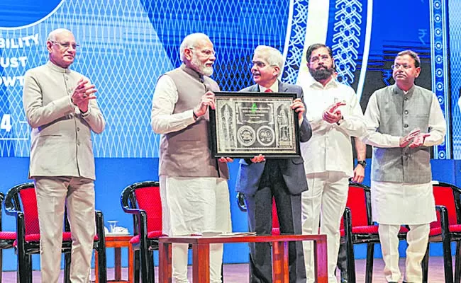 PM Modi Praises RBI On 90th Anniversary  - Sakshi