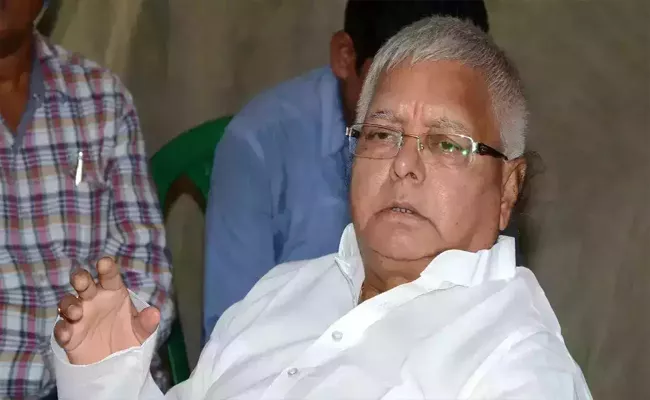 Gwalior court Arrest Warrant Issued Against Lalu Prasad Yadav - Sakshi