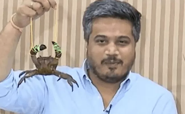 PETA seeks action against Maharashtra MLA for dangling crab - Sakshi