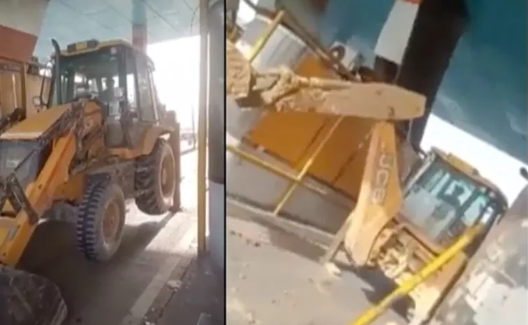 Toll Booth Damaged By Buldozer In Uttarpradesh