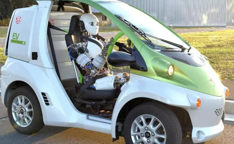 Humanoid Chauffeur in Driving Seat For Future Robotaxi