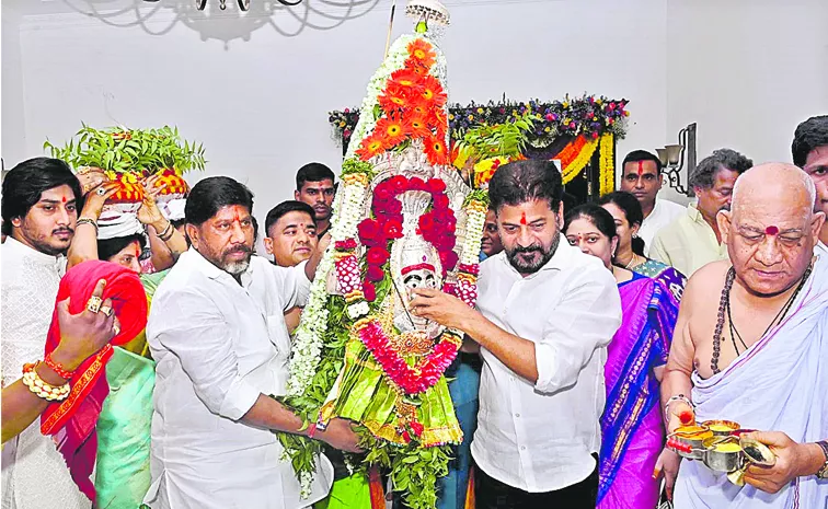 Cm Revanth Reddy Gave Bona To Nalla Pochamma In Praja Bhavan