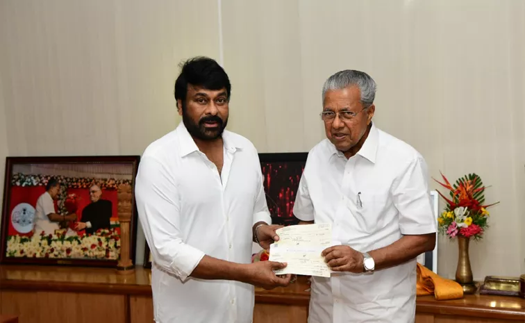 Chiranjeevi Gives one Crore Rupees Cheque To Kerala CM Relief Fund