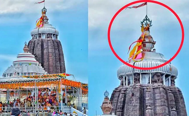 Unknown man climbs on the Peak of Odisha's Puri Jagannath temple