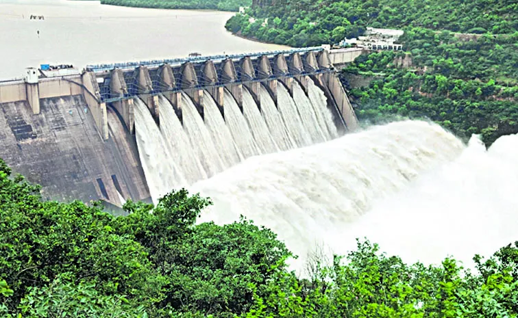 Heavy Rain Causes Floods Nagarjuna Sagar Projects Face High Inflows