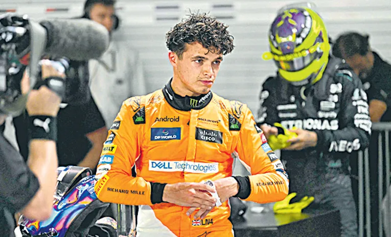 Norris beats Verstappen to pole for Singapore GP after Sainz crashes out