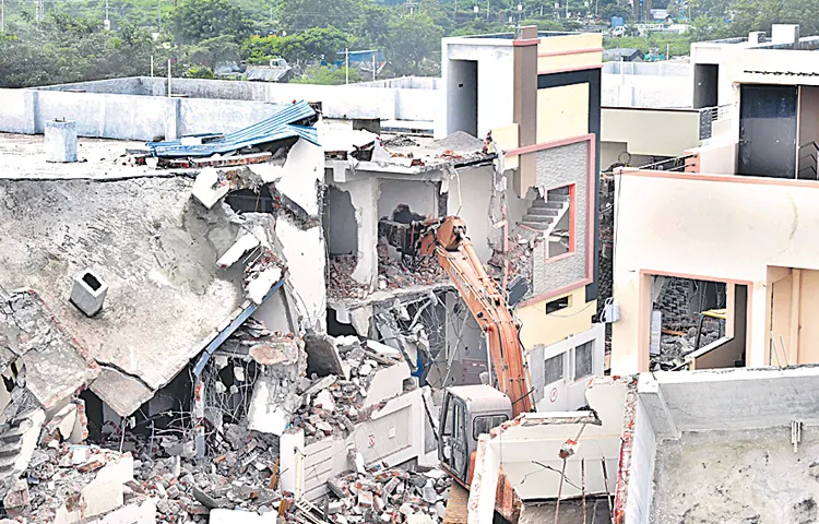 Demolition of illegal structures in Kishtareddypet and Patelguda