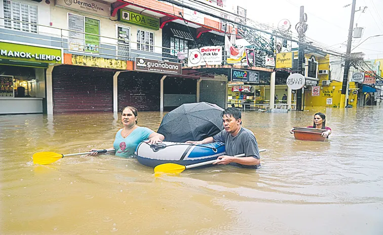 Tropical Storm Yagi sets off floods and landslides in Philippines