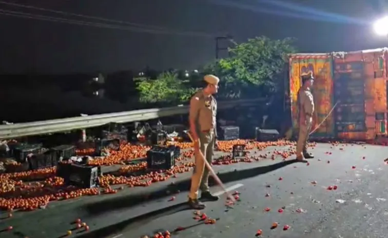 Highway Tomato Truck Overturned Police Guard