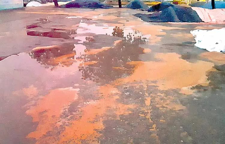 Grain washed away in a flood in a market yard