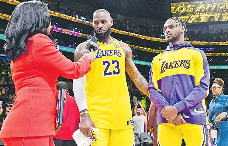 LeBron James and his son Brony James who entered the ring in the same match