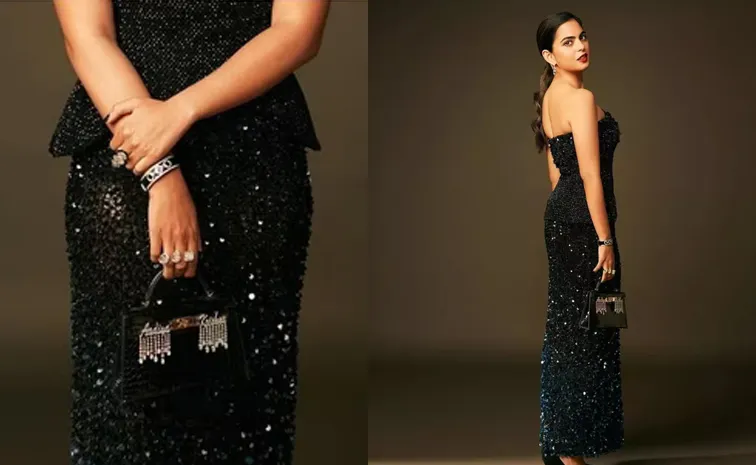 Isha Ambani styles in elegant black outfit and Hermes Kelly bag at Fashion event