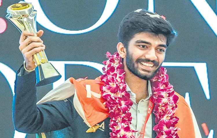 Gukesh receiving the World Championship trophy