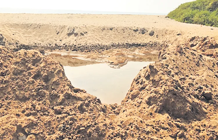 Illegal excavations on the Bhimili coast