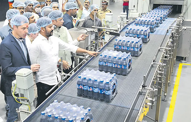 CM Revanth at the inauguration of Coca Cola factory in Siddipet district