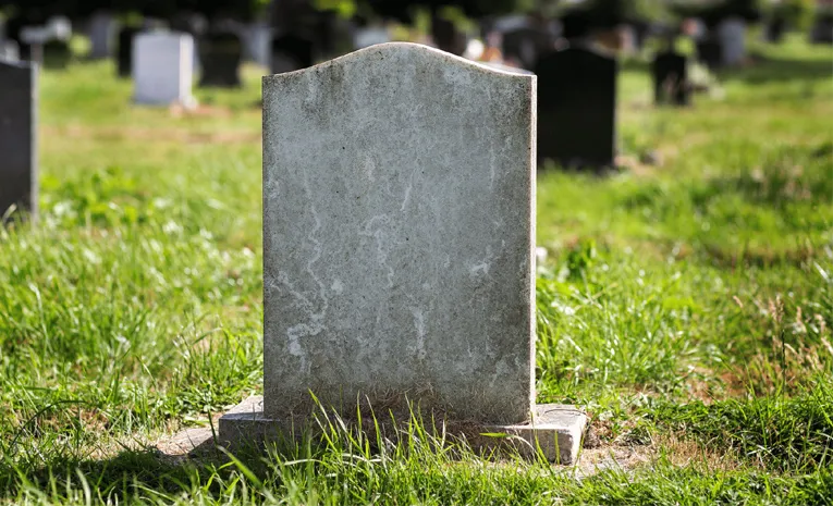 Husband commits suicide at wife grave