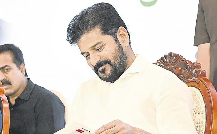 CM Revanth Reddy Unveils Former Governor Vidyasagar Rao Autobiography Unika Book