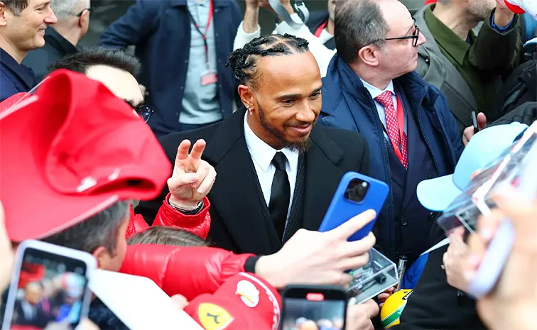 Lewis Hamilton meets Ferrari team members on his first visit to Maranello