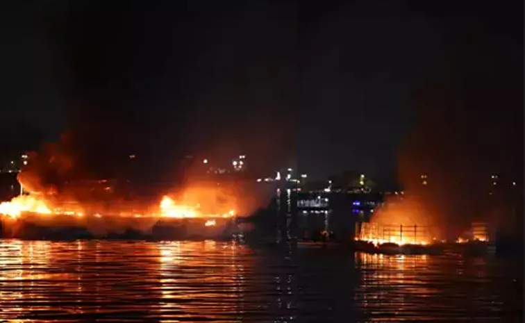 Major Fire Breaks Out In Hussain Sagar Hyderabad