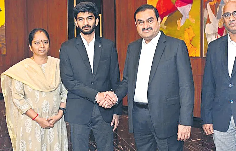 Industrialist Gautam Adani meets with Dommaraju Gukesh