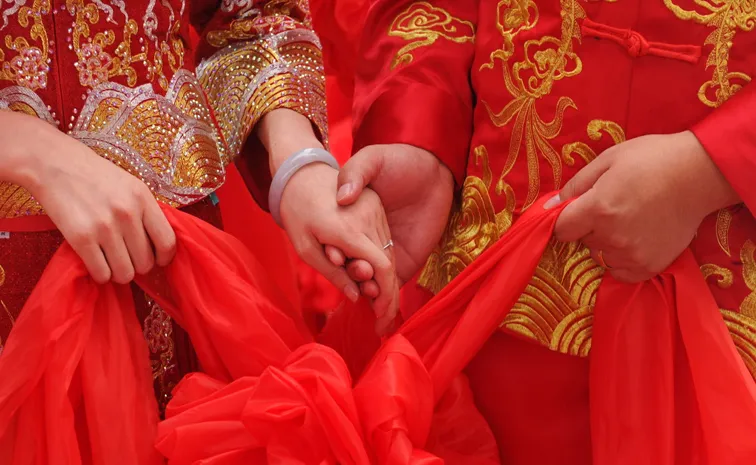 Chinese Woman scams Relatives Of Rs 14 Crore By Staging Fake Wedding With Rich Man