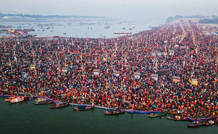 Record of Devotees in Mahakumbh number of People Taking dip Crosses 50 Crores