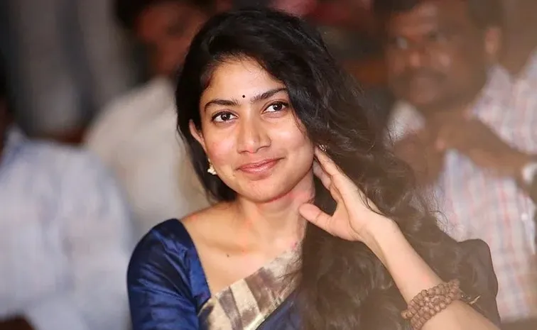 Fan Kisses Sai Pallavi at Thandel Event