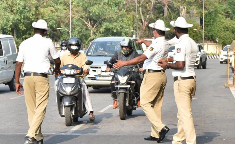 Bengaluru Scooterist Triple Century In Traffic Challans