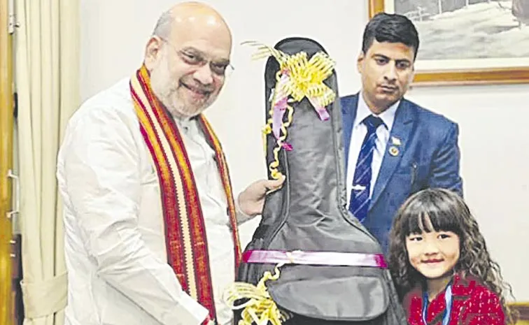 Amit Shah Praises Gifts Guitar To Mizoram Wonder Kid