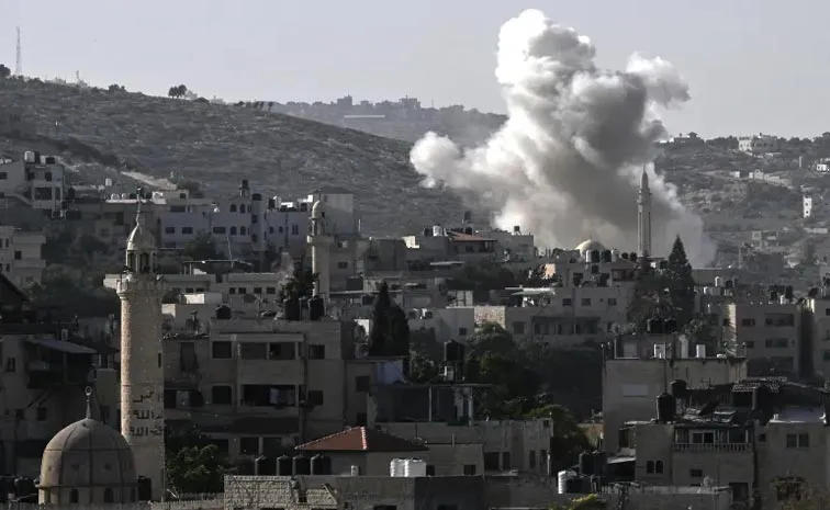 Israeli attacks kill at least 26 people in gaza