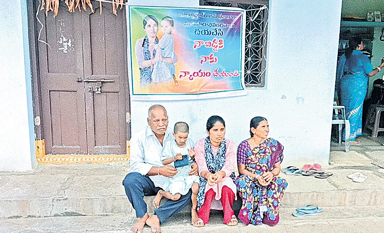 wife protest in front of husband in warangal