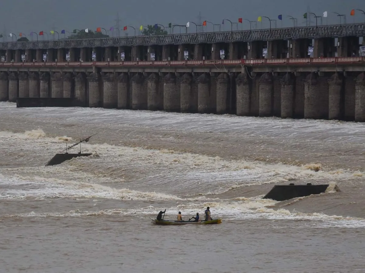 Prakasam Barrage 60 Gates Lifted In Krishna District - Sakshi