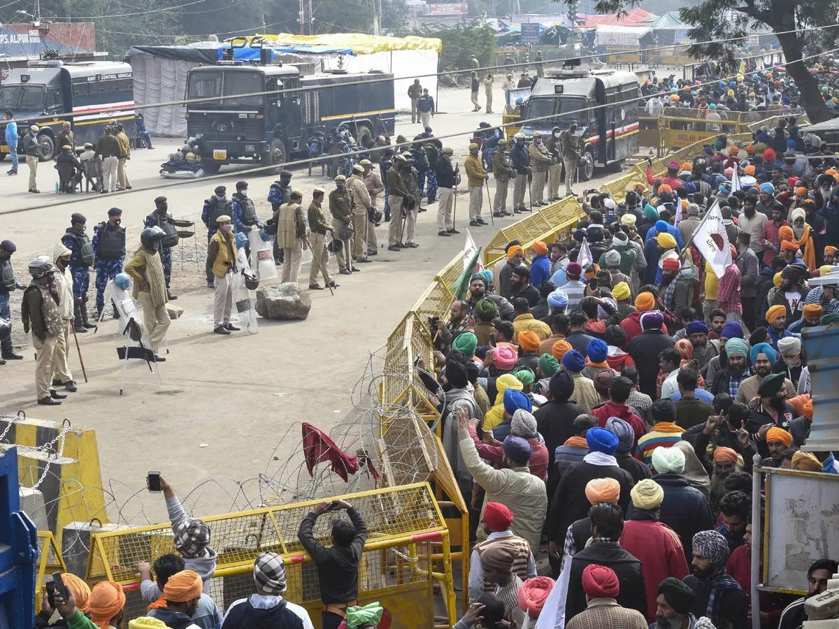 Farmers during their protest against the new farm laws - Sakshi