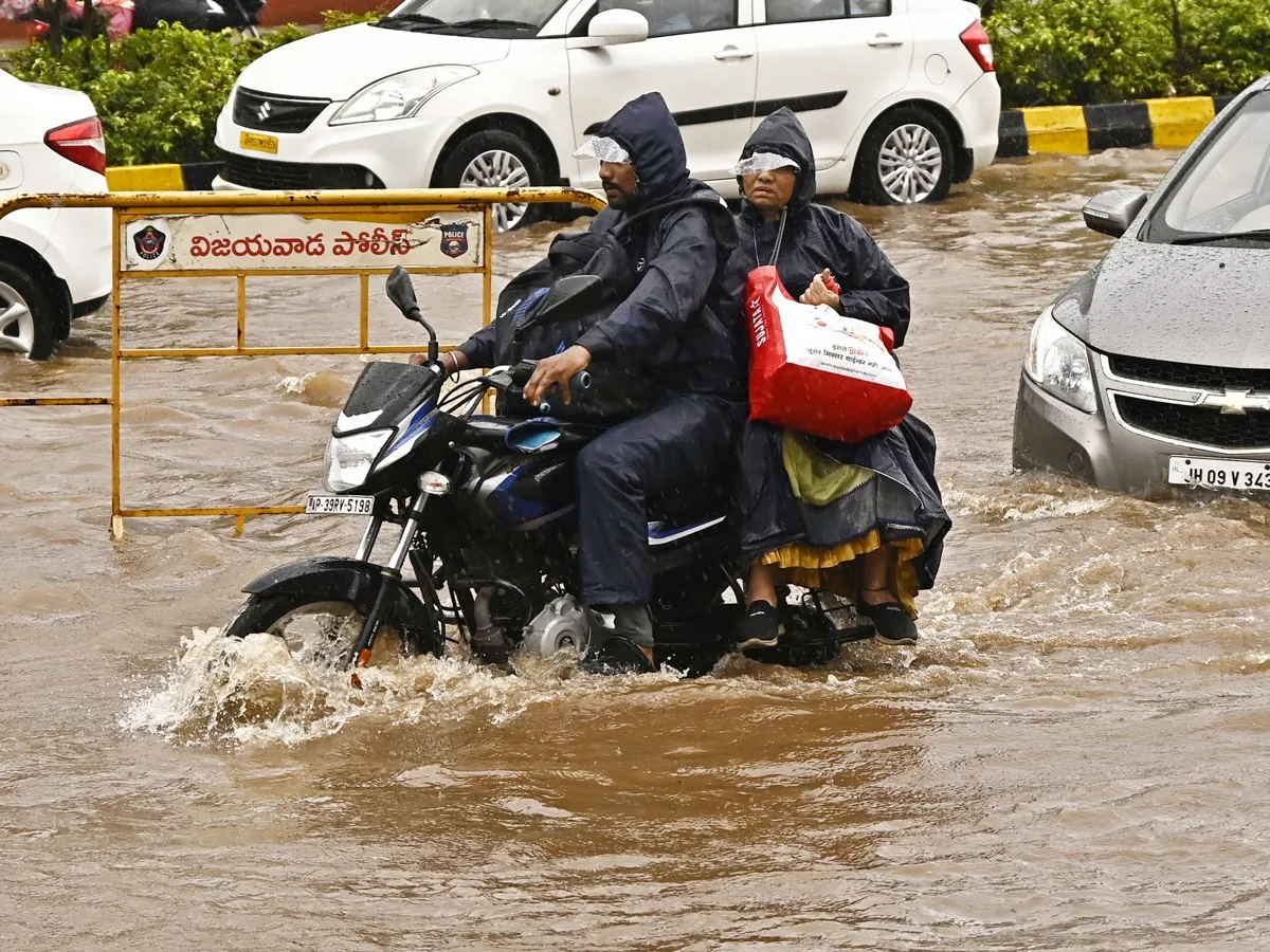 Heavy Rains And Floods In Vijayawada Photos Viral