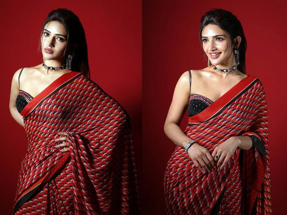 Sreeleela mind blowing poses in red saree