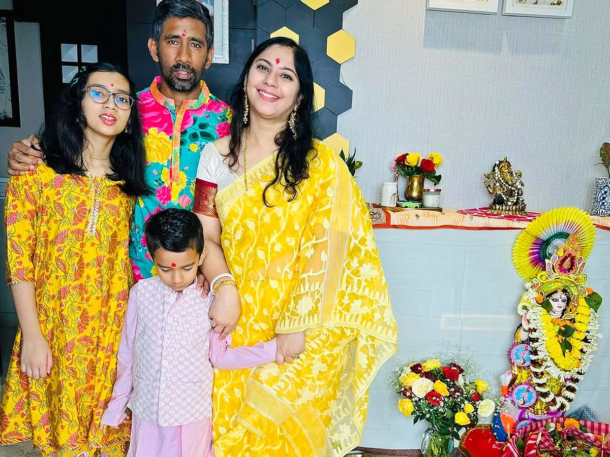 Cricketer Wriddhiman Saha Celebrating Saraswati puja at home with family Photos