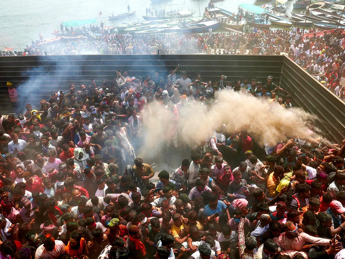 Photos Of Hindu devotees celebrate Holi With Bhasma In Varanasi