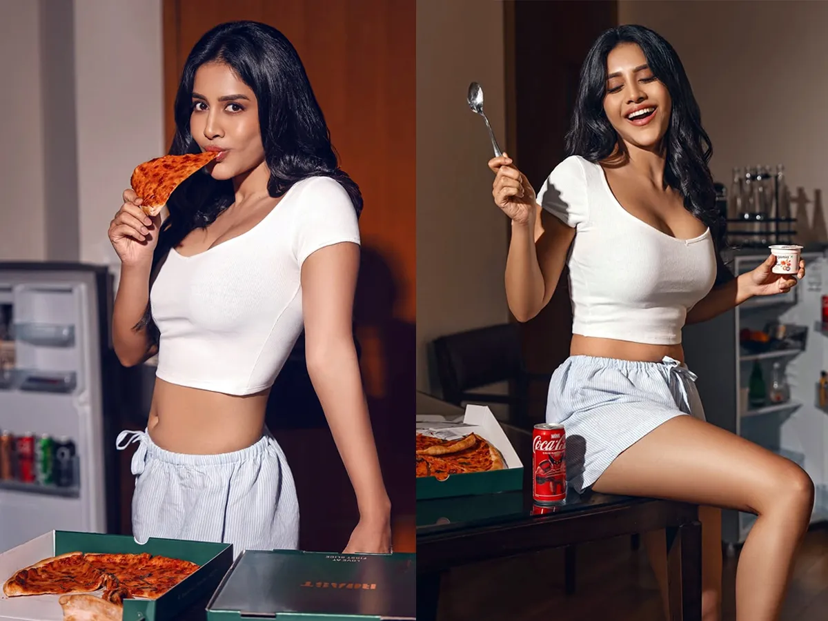 Nabha Natesh is eating pizza in a white skirt