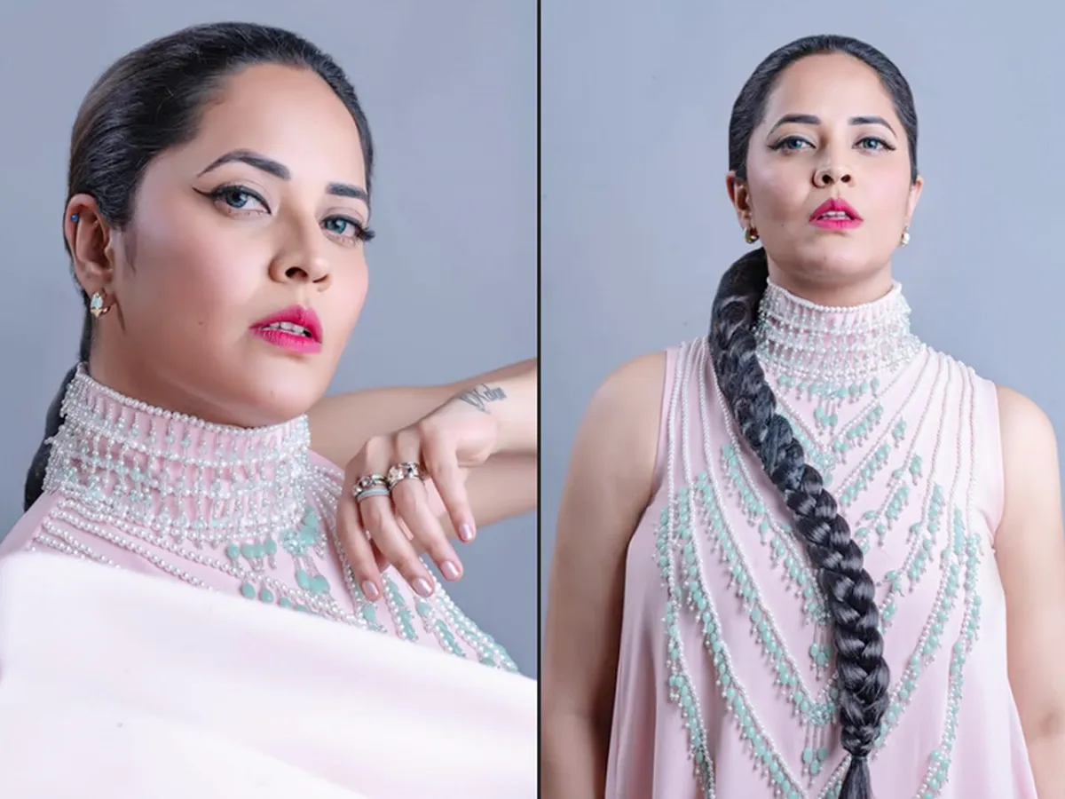 Anasuya Bharadwaj show stopping in soft pink attire 